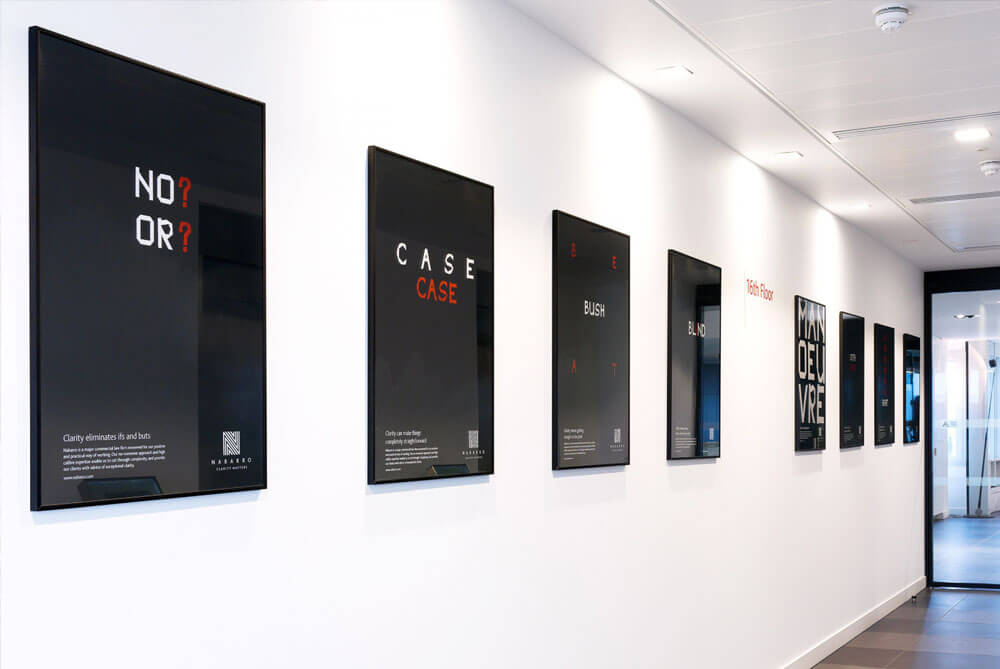 <span>Lobby Posters</span><i>→</i>