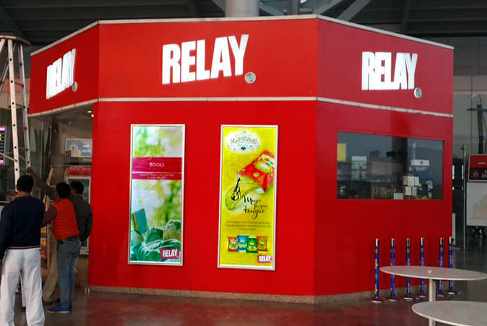 <span>T1 Airport Signage</span><i>→</i>
